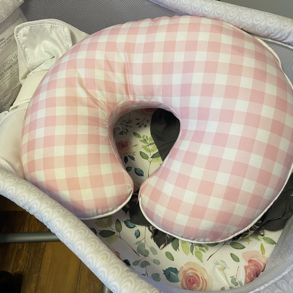 Boppy pillow with pink plaid cover
